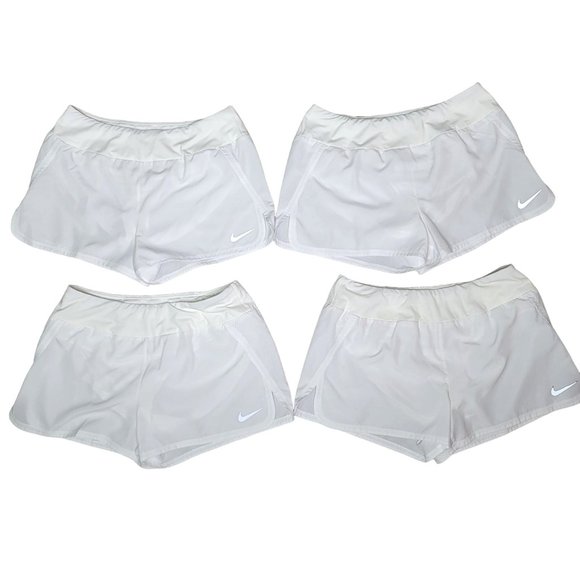 Nike dri fit white running shorts set of 4. pocket on back with lining size Larg - Picture 1 of 13